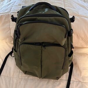 Lululemon backpack, army green color, multiple pockets